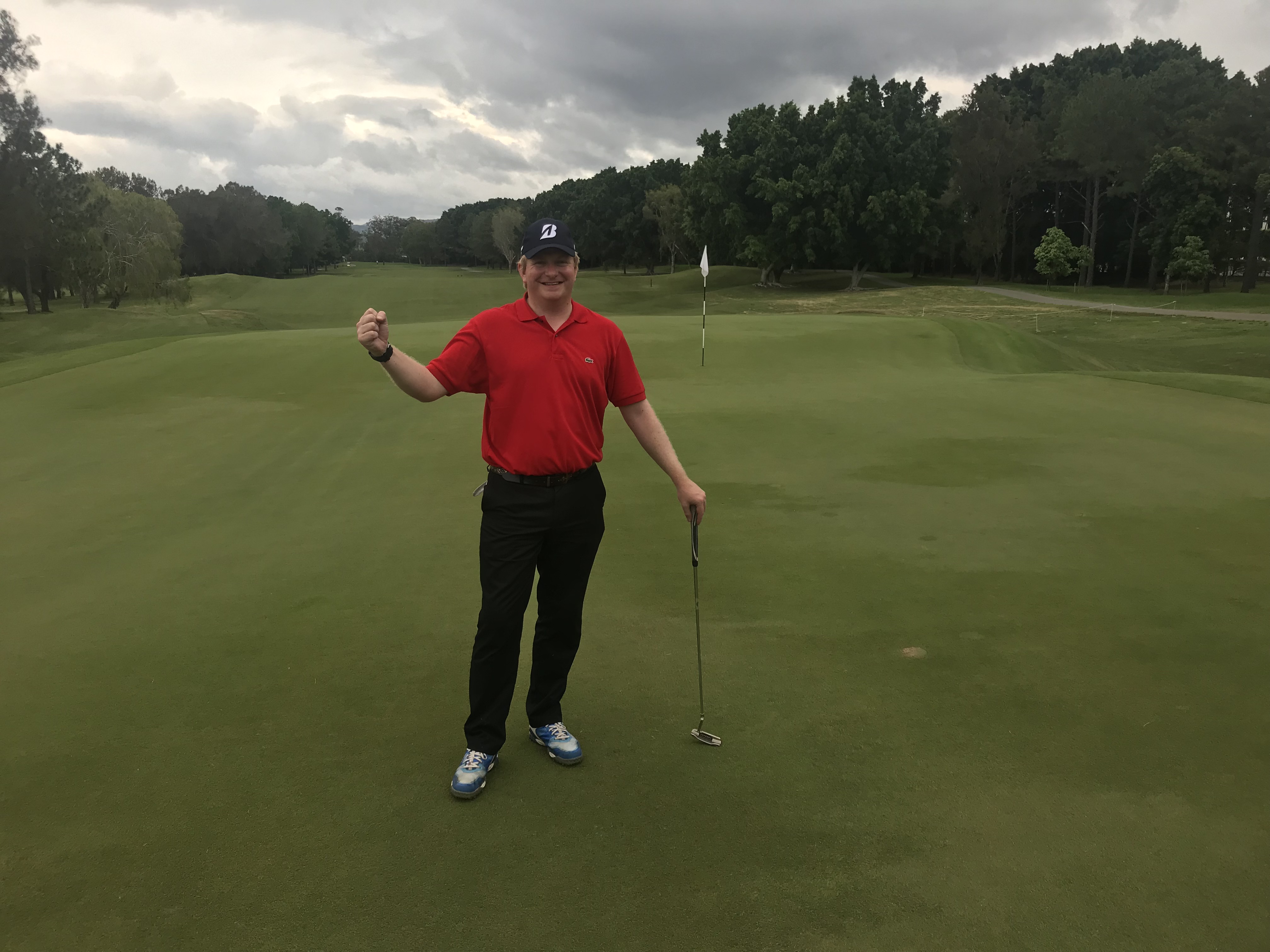 John Osment celebrating on the 18th at RACV Royal Pines